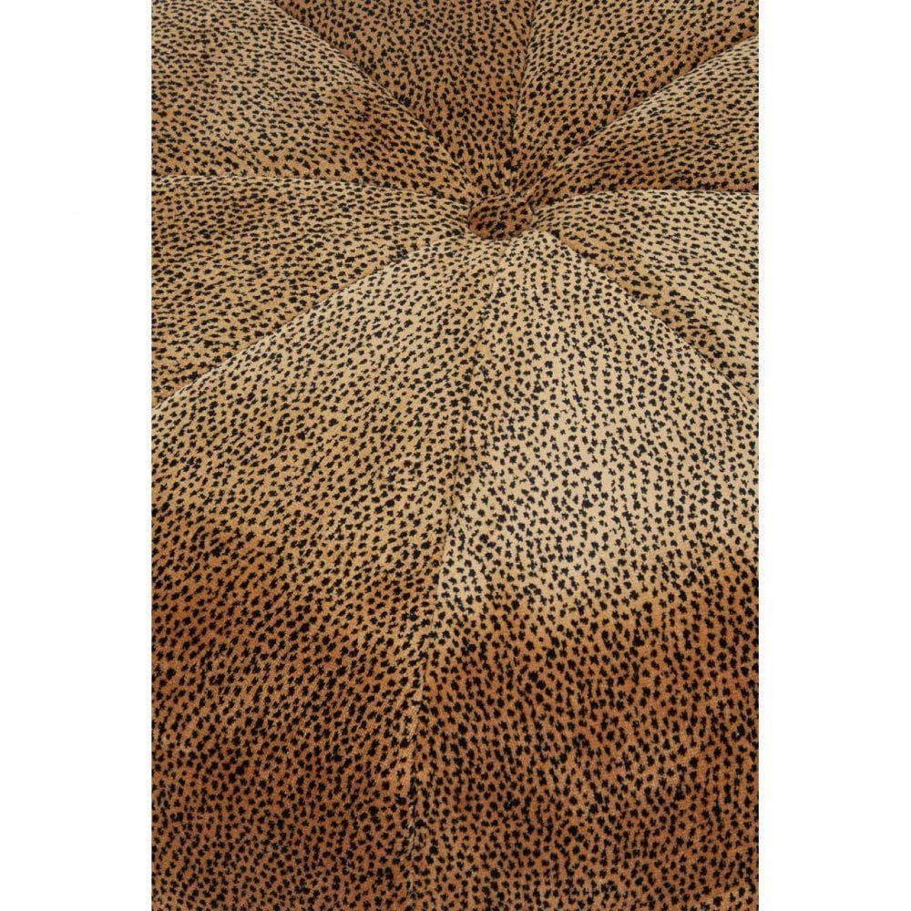 Close up of leopard print upholstered ottoman with textured fabric and central tuft