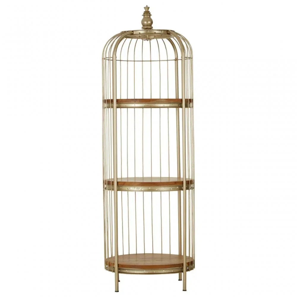 Tall gold metal shelving unit with three round wooden shelves and decorative finial top