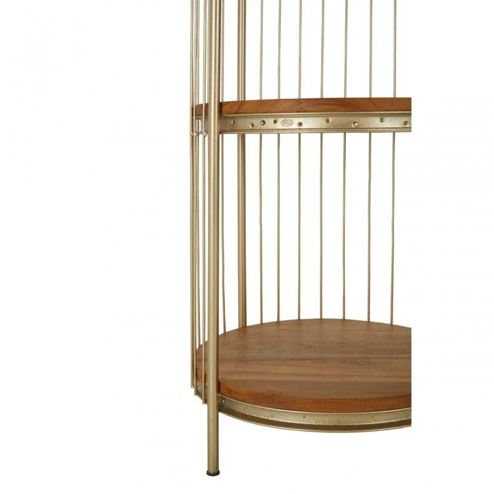 Close detail of round wooden shelf unit with gold metal frame and vertical rods