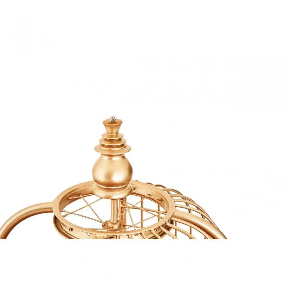 Gold metal clock finial with decorative top and circular wire frame detail