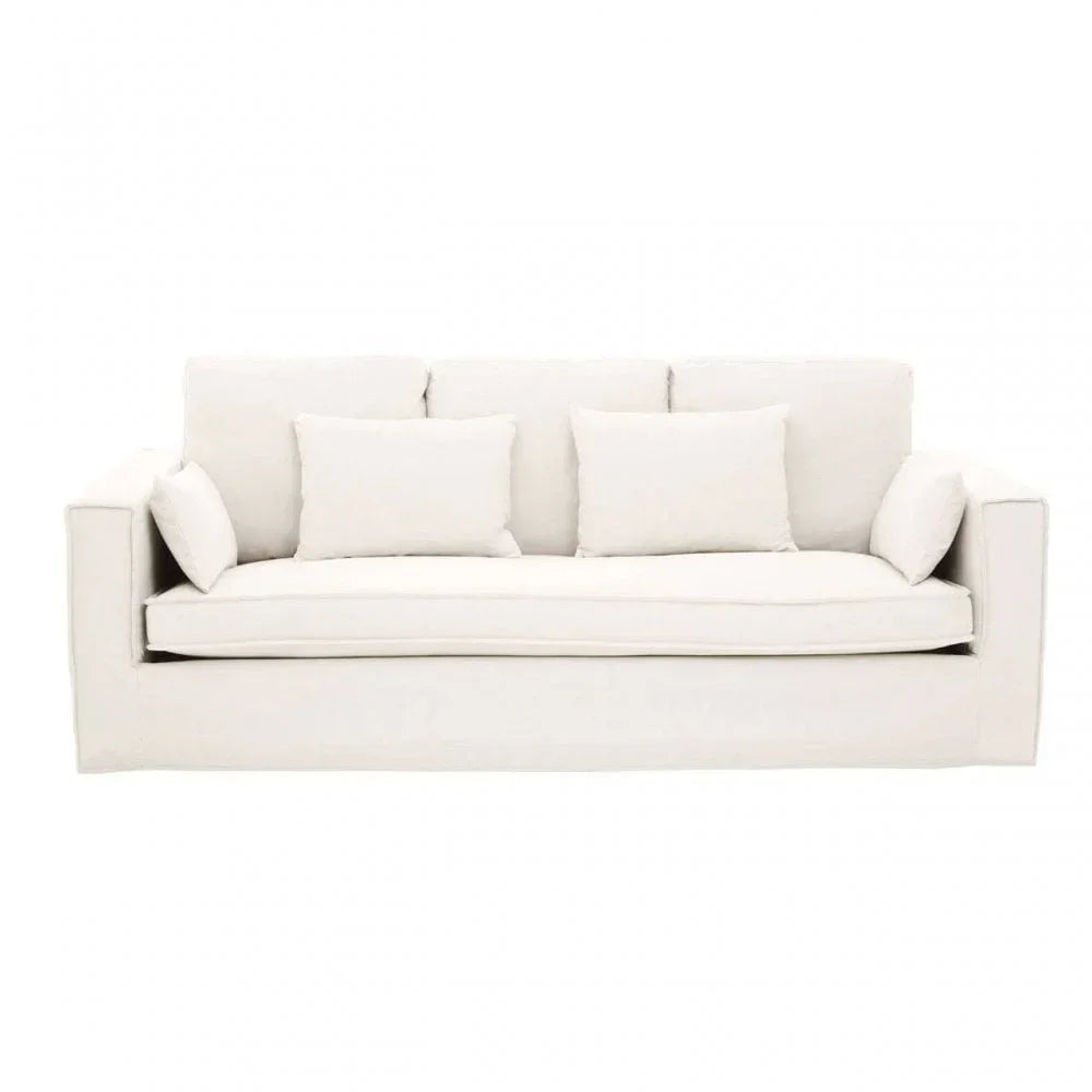 Modern cream fabric sofa with square arms and five matching cushions, front view