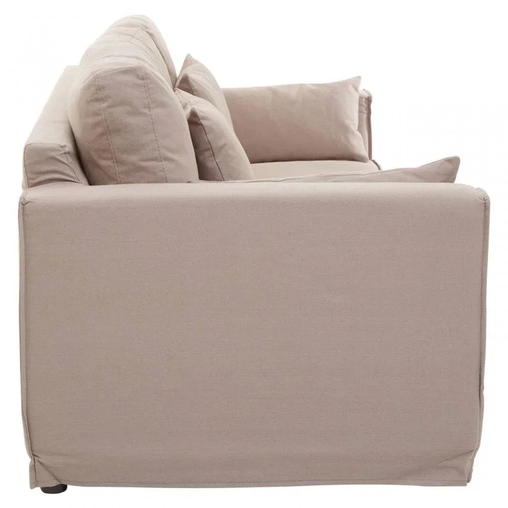 Side view of beige fabric sofa with cushions and straight armrest