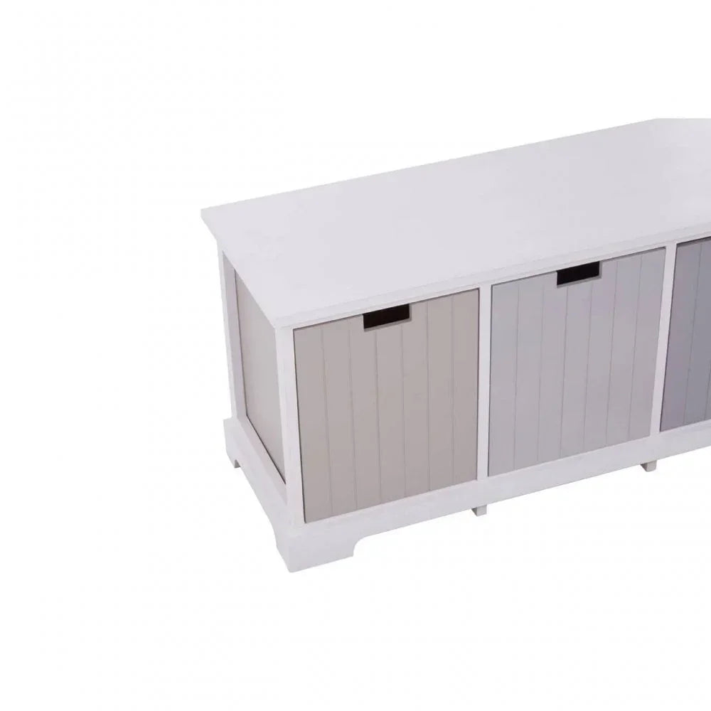 White wooden storage bench with three panelled compartments and cut-out handles