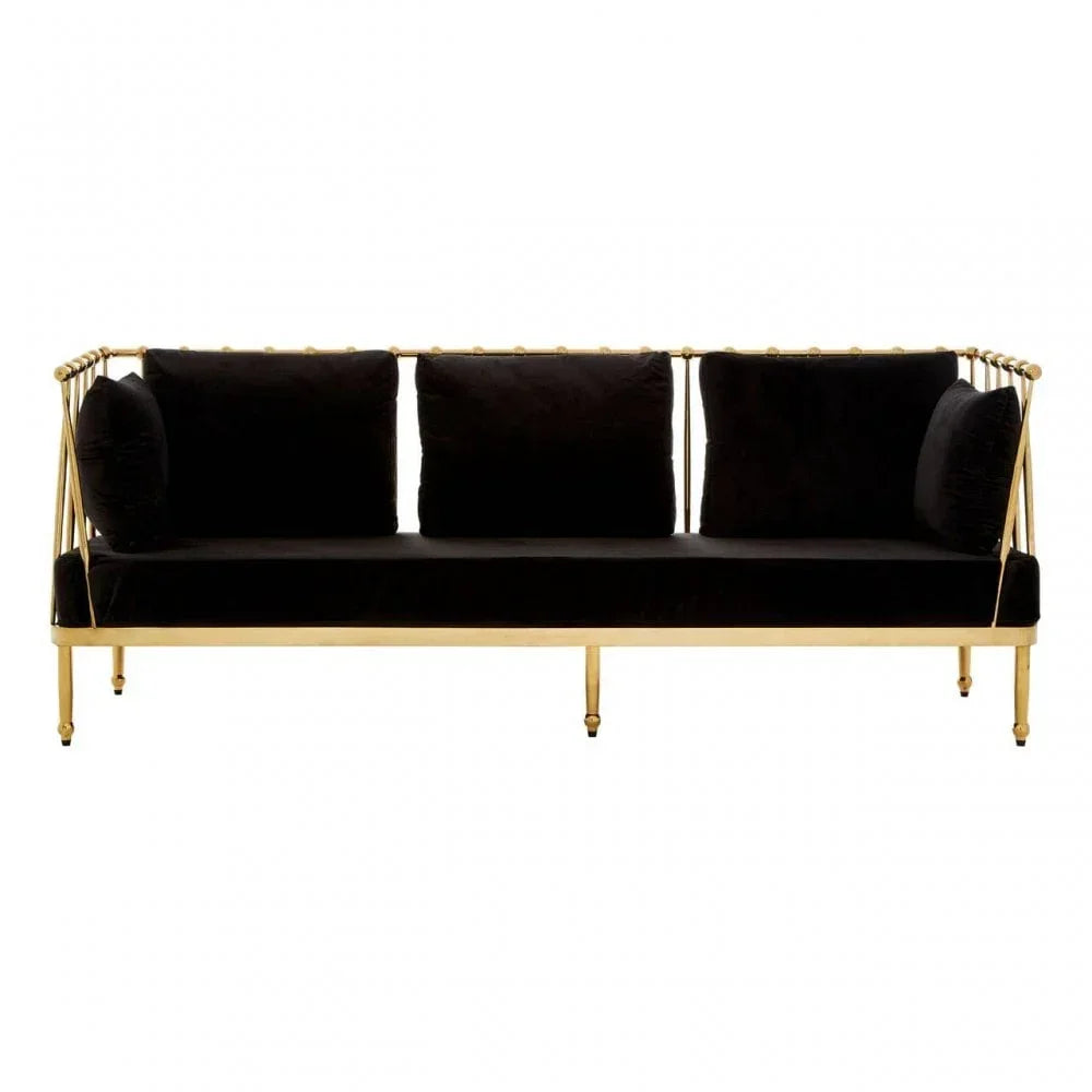 Black velvet sofa with gold metal frame and three back cushions, front view
