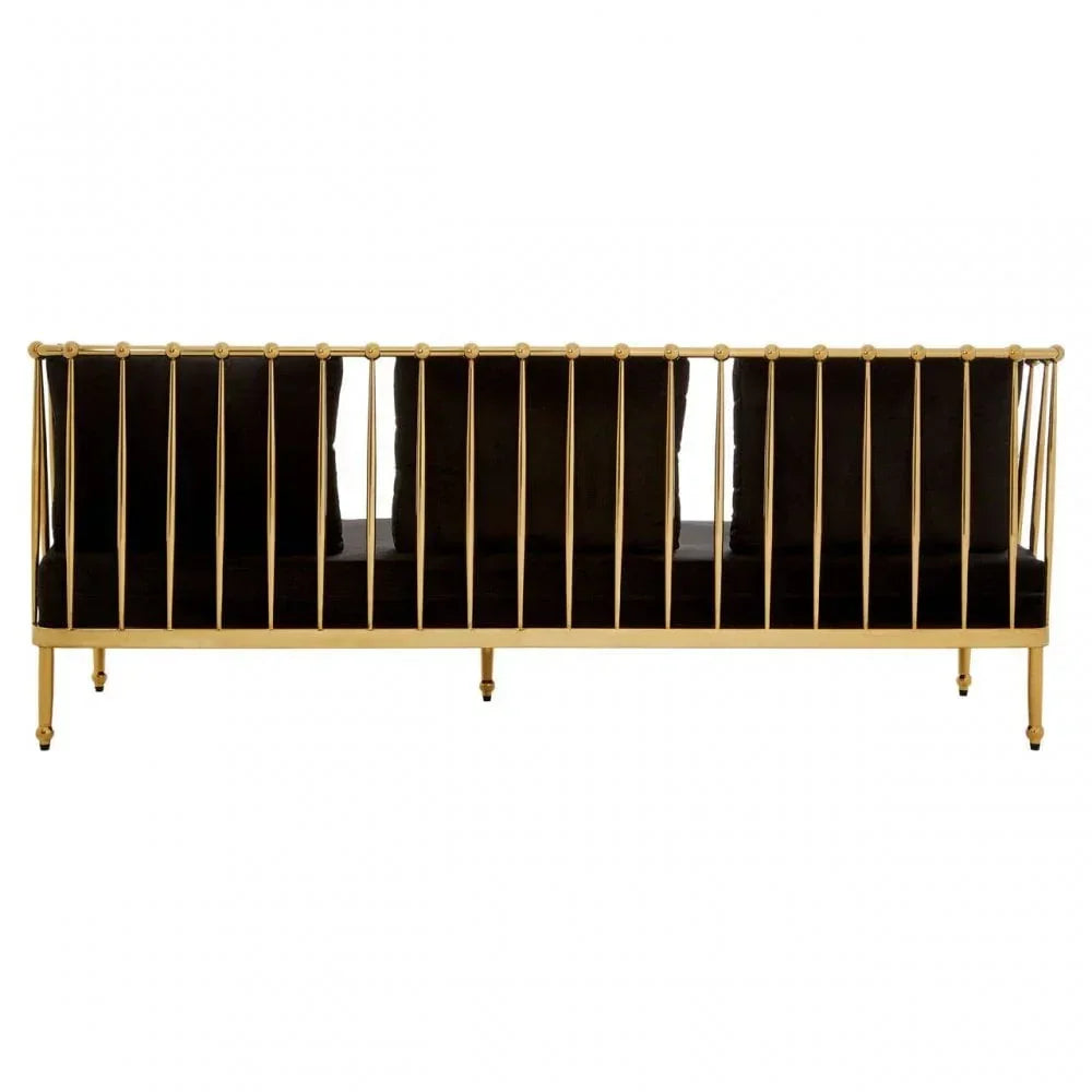 Gold metal frame sofa with black velvet cushions, rear view, modern living room furniture