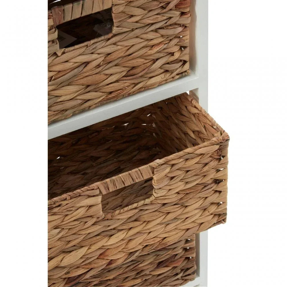 Closeup of woven storage basket drawer in white wooden shelving unit