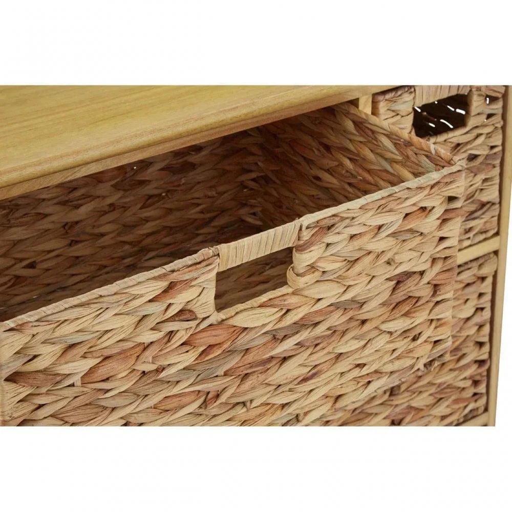 Closeup of woven rattan storage drawer with integrated handle in wooden frame