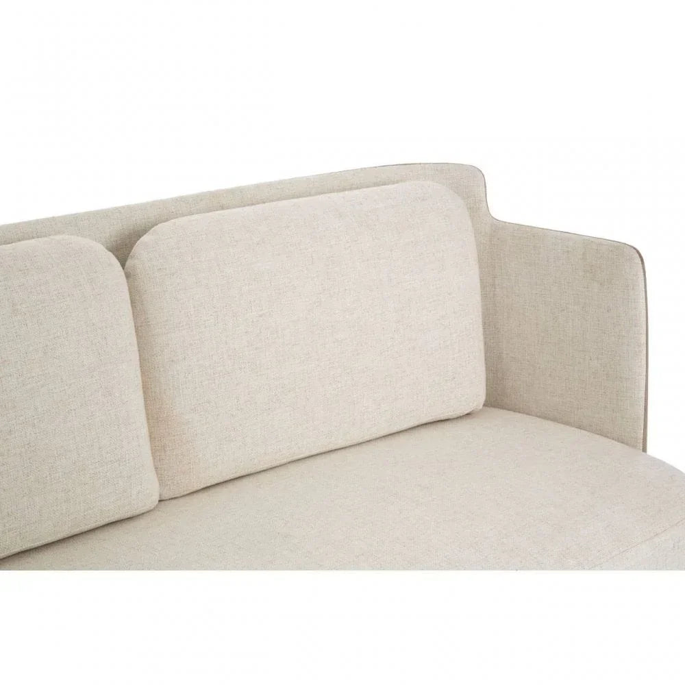 Beige fabric sofa corner with square back cushions and clean lines