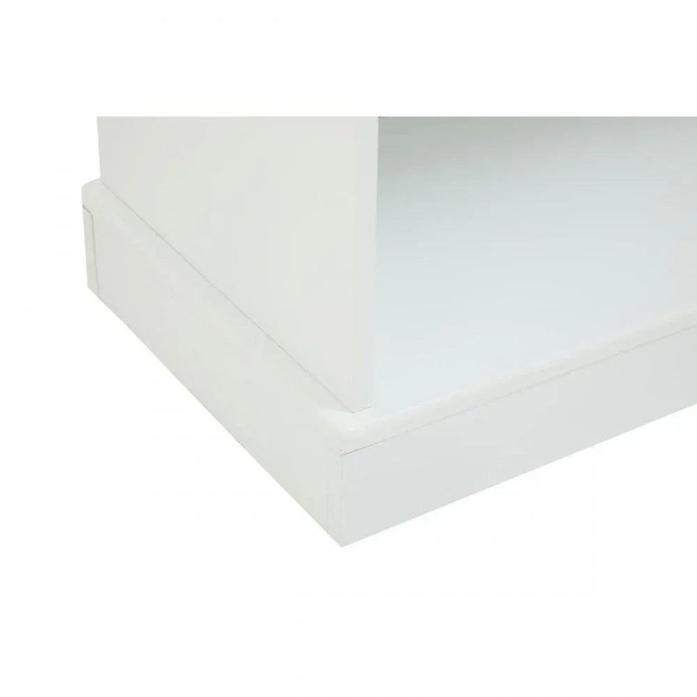 White wooden furniture base corner showing shelf edge and smooth finish