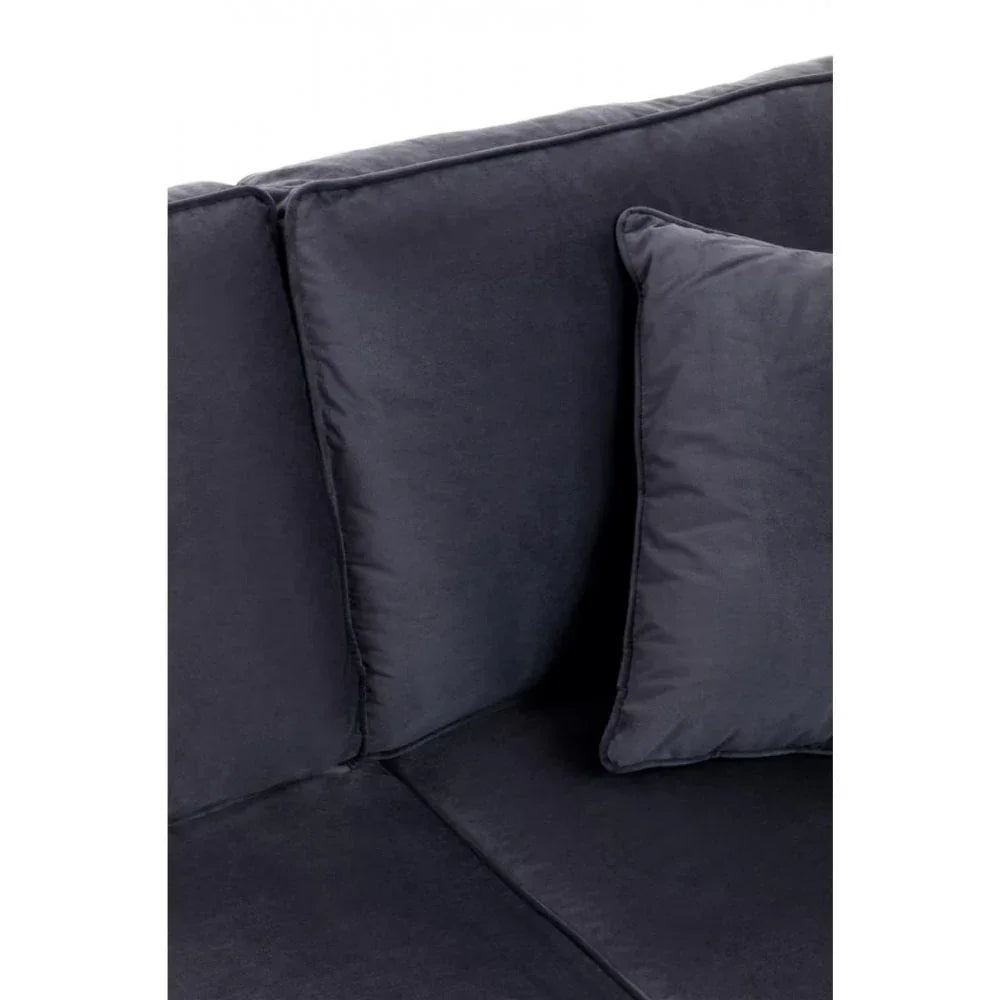 Close-up of dark fabric sofa with matching backrest and scatter cushion