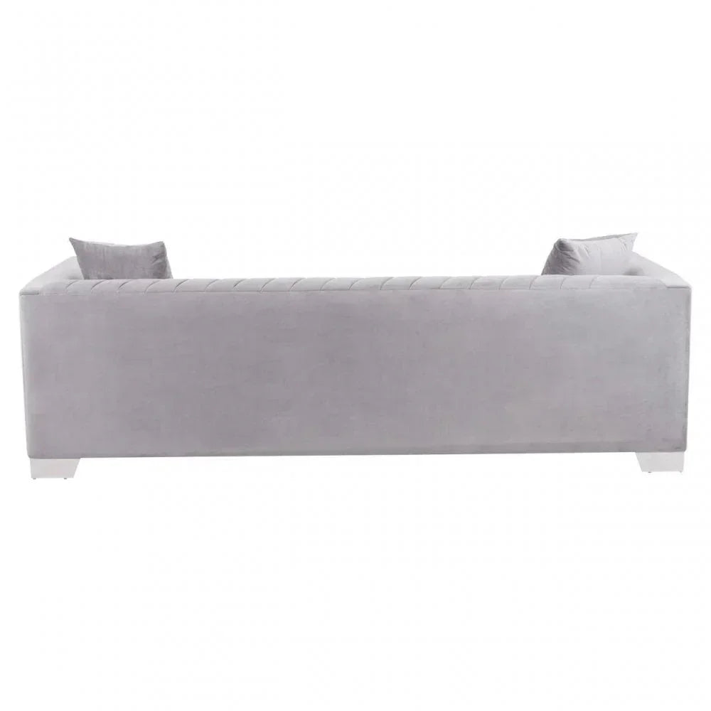 Back view of light grey velvet sofa with two matching cushions