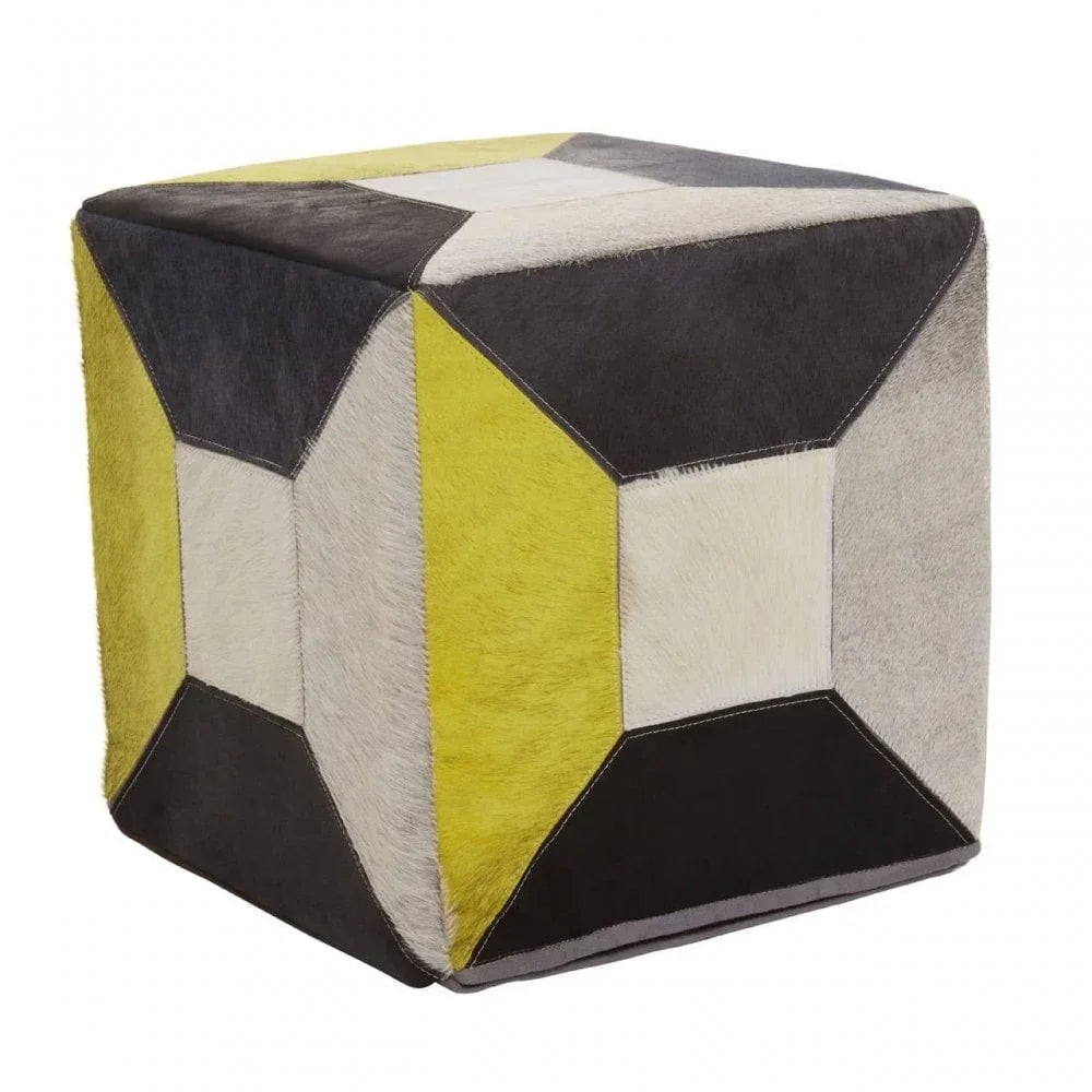 Geometric cube pouffe in black, grey, yellow and white patchwork upholstery