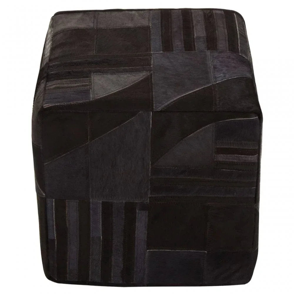 Black patchwork leather pouffe with geometric pattern, cube shape, front view