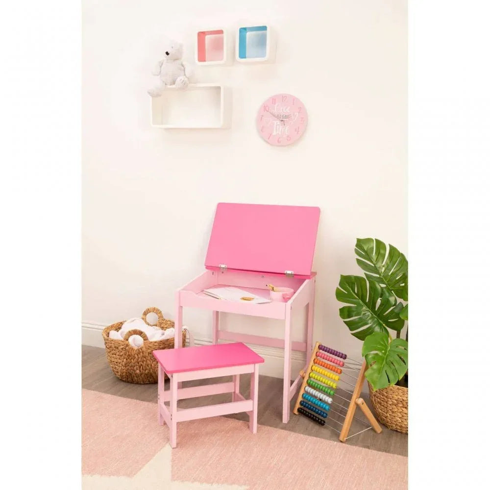 Pink kids desk and bench set in playroom with abacus and basket decor