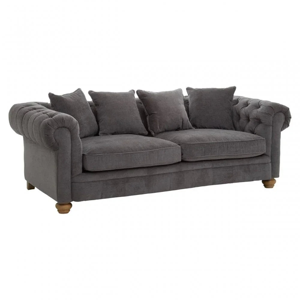 Grey fabric sofa with tufted arms, plush cushions and wooden legs, front angle view