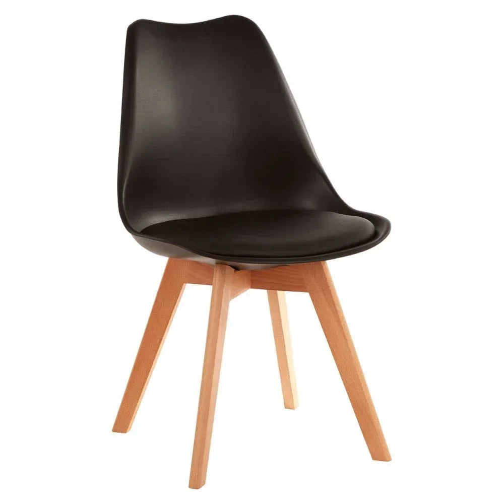 Modern dining chair with black plastic seat and angled wooden legs on white background