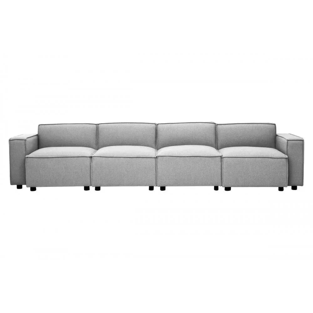 Modern grey modular fabric sofa with four seats and square armrests, front view