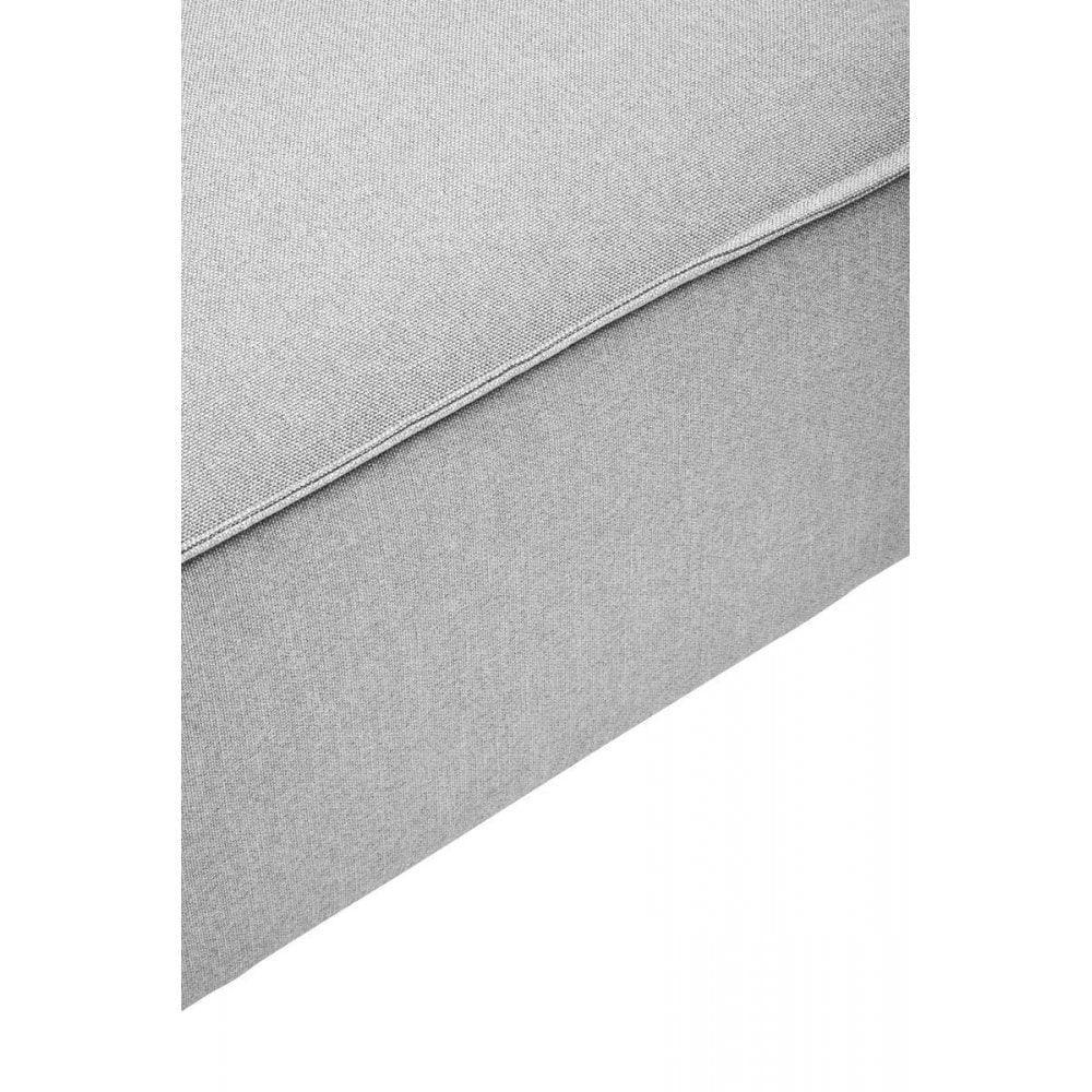 Closeup of light grey fabric sofa base and seat corner detail