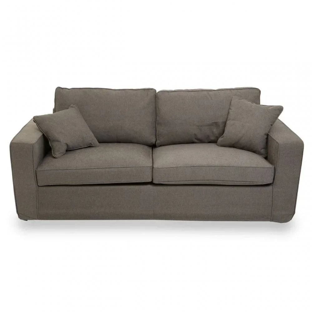 Grey fabric sofa with square arms and two matching scatter cushions, front view