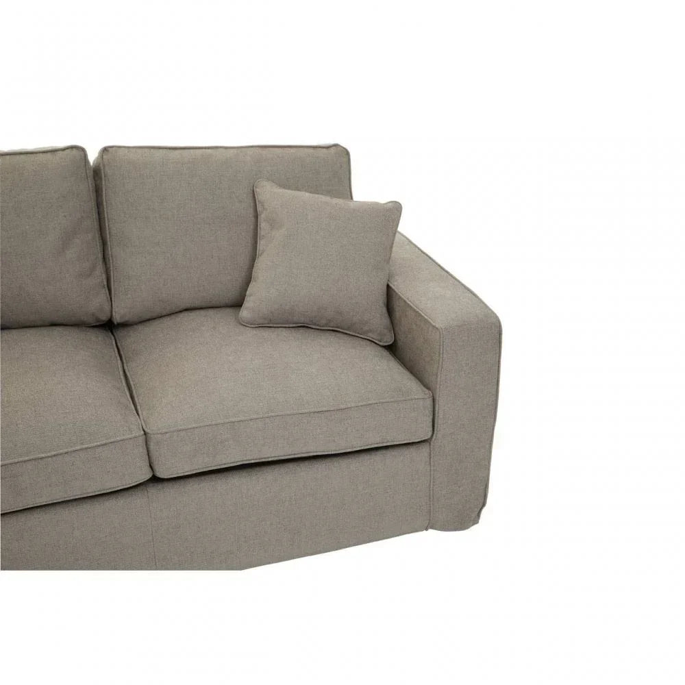 Light grey fabric sofa with square armrest and matching scatter cushion closeup