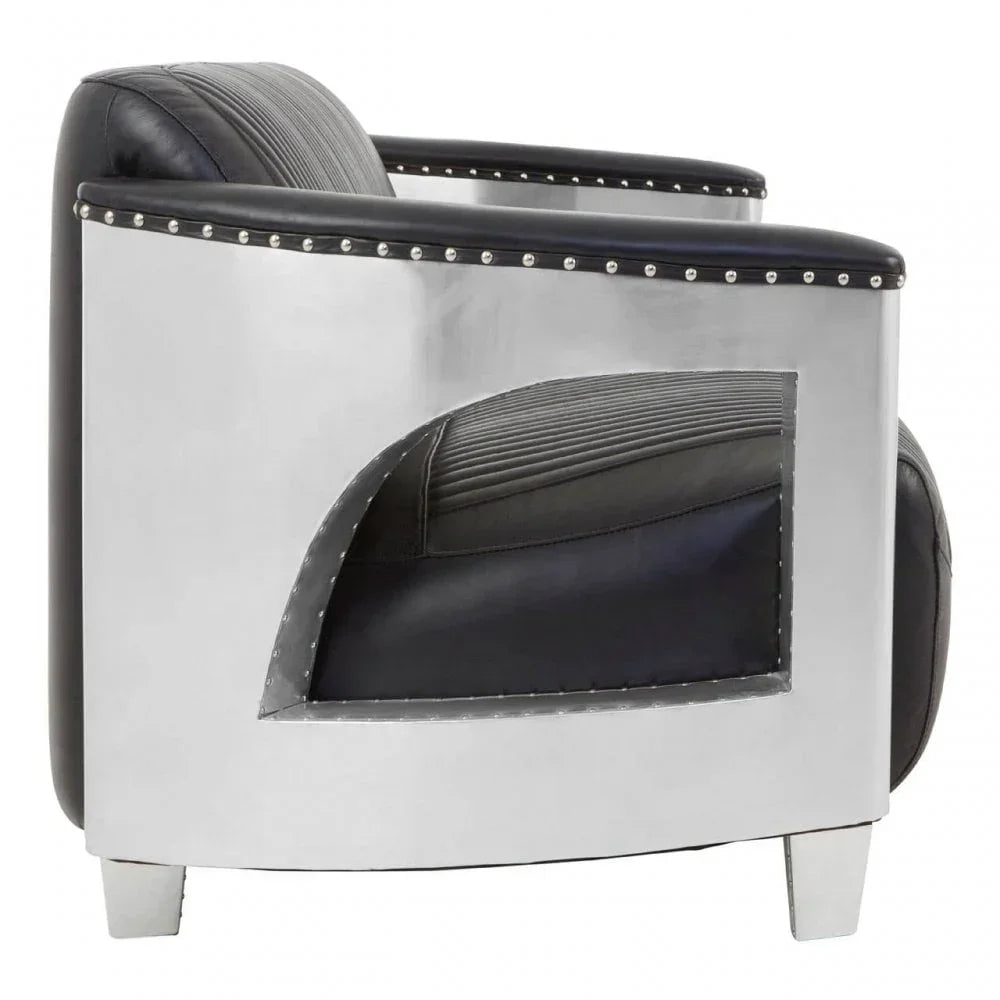Modern armchair with black leather upholstery and polished metal sides, angled view