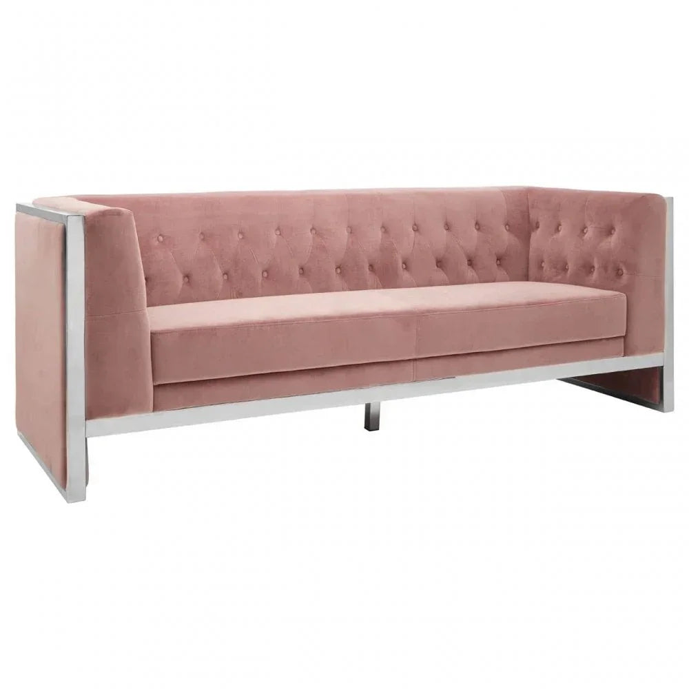 Pink velvet sofa with tufted backrest and chrome frame, modern three-seater furniture