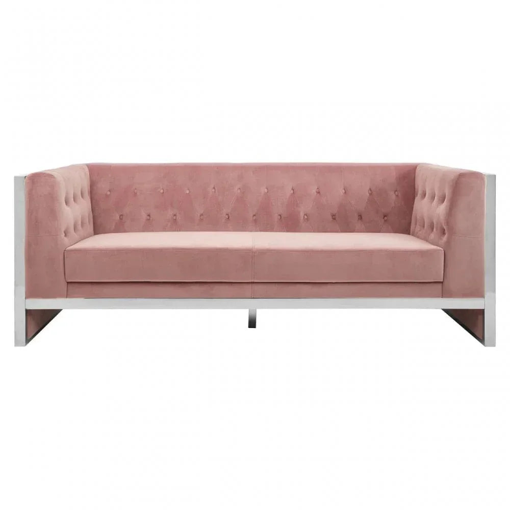 Pink velvet sofa with tufted backrest and chrome frame, modern design, front view