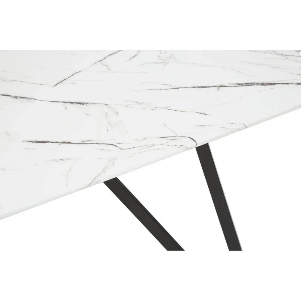 White marble dining table top with black veining and black angled metal legs