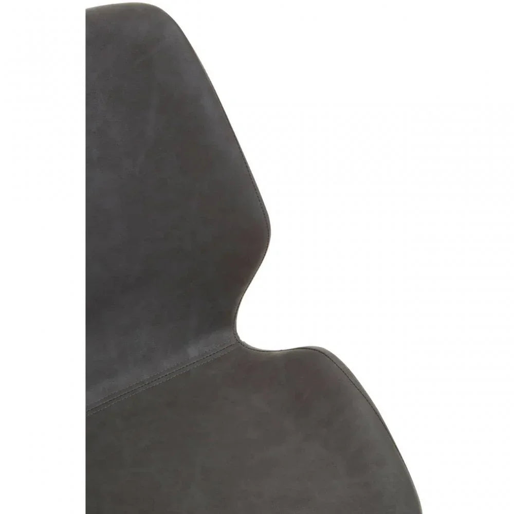 Close-up of grey dining chair backrest with curved upholstered design