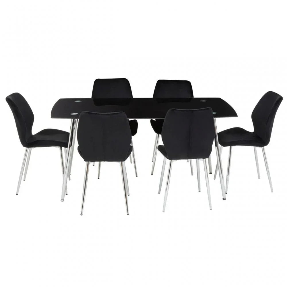Black glass dining table set with six black chairs and chrome legs, front view