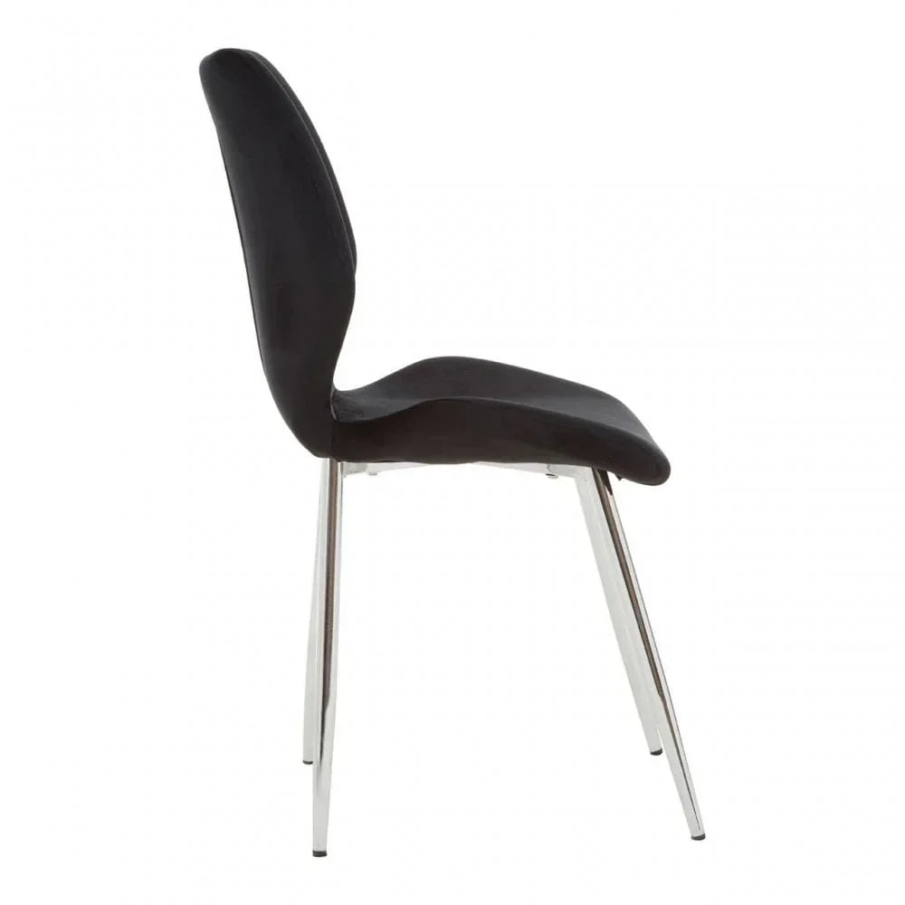 Black dining chair with padded seat and chrome legs, side profile view