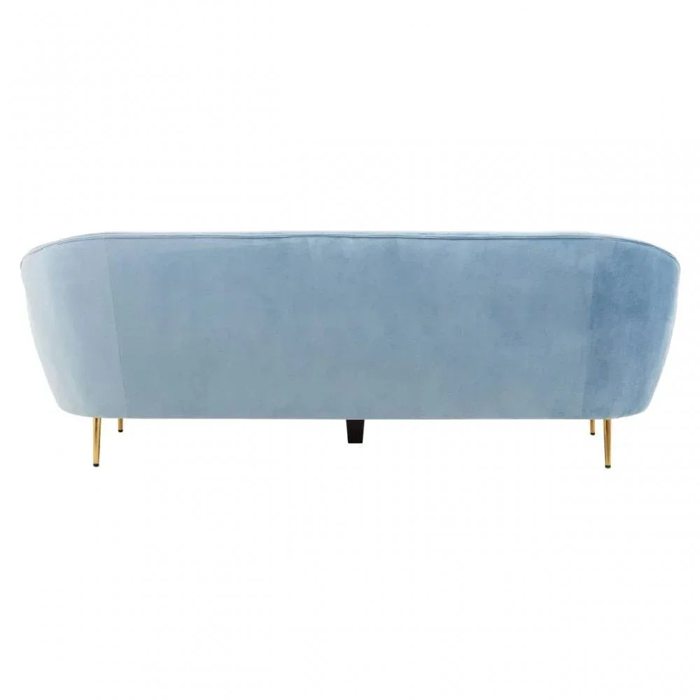 Back view of light blue velvet sofa with slim gold legs