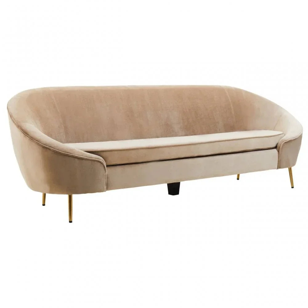 Beige velvet sofa with curved backrest and slim gold legs on white background