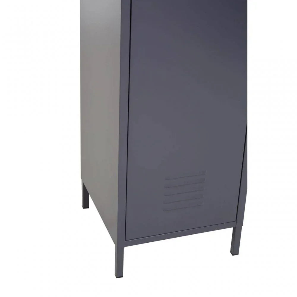 Close view of dark grey metal storage cabinet legs and door with vent detail