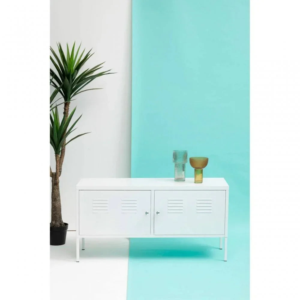 White metal sideboard cabinet with two doors, glass vases on top, indoor plant beside