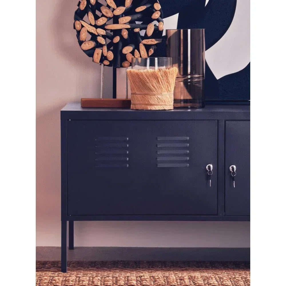 Black metal sideboard with locking doors, decor accessories and woven mat underneath