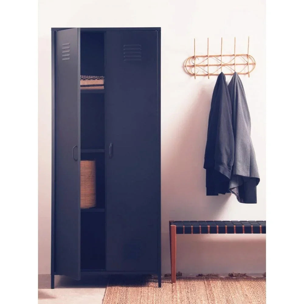 Black metal storage wardrobe with double doors beside hallway bench and coat rack