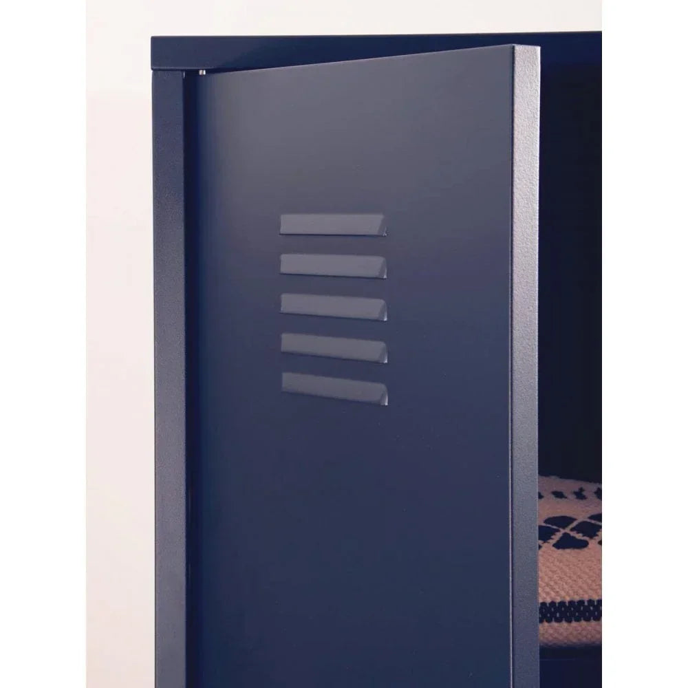 Metal storage cabinet door in matte navy finish, partial view with louvered vents