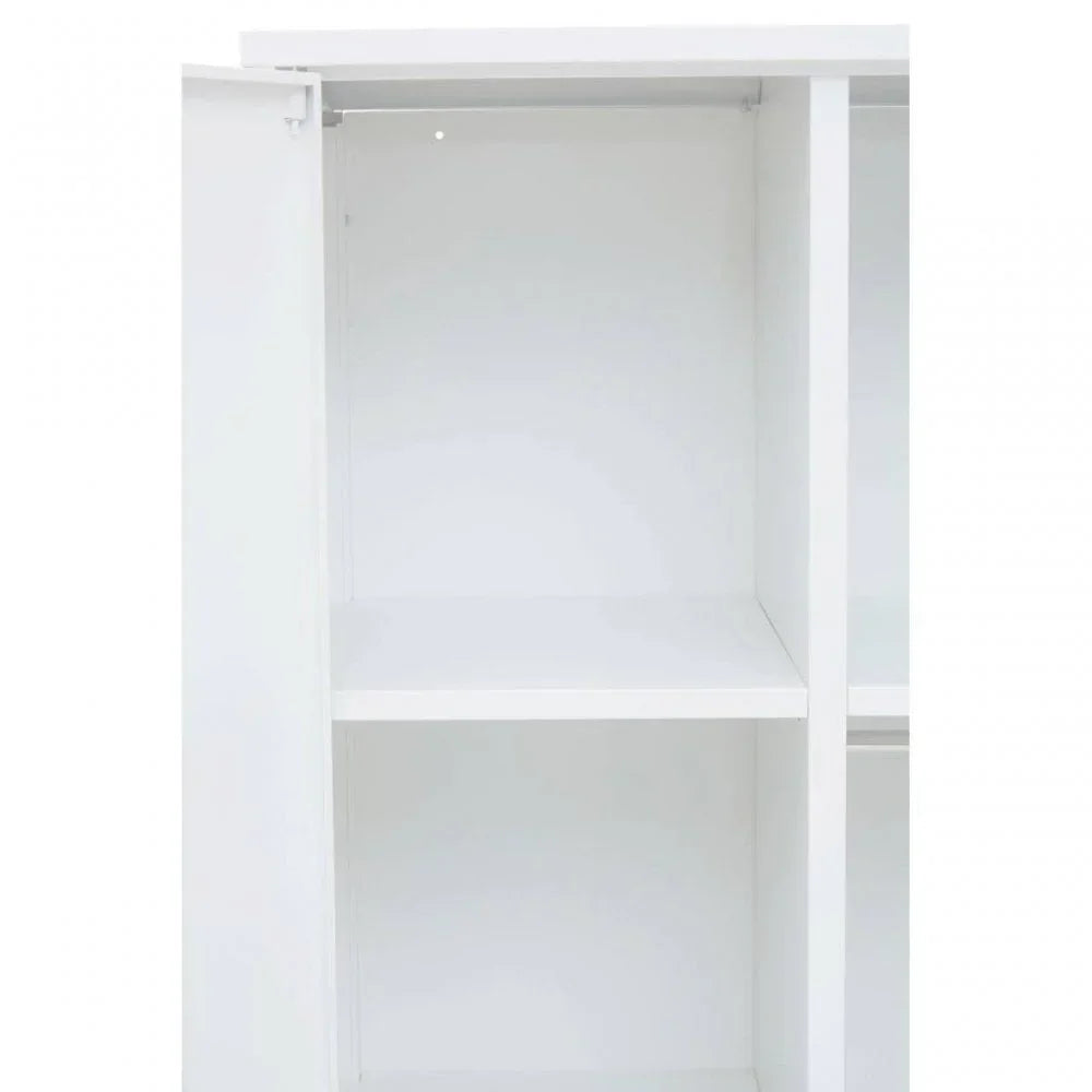 White wardrobe interior with open door showing upper shelf and hanging rail