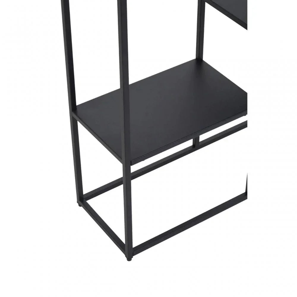 Closeup of black metal shelving unit with rectangular shelf and simple frame design