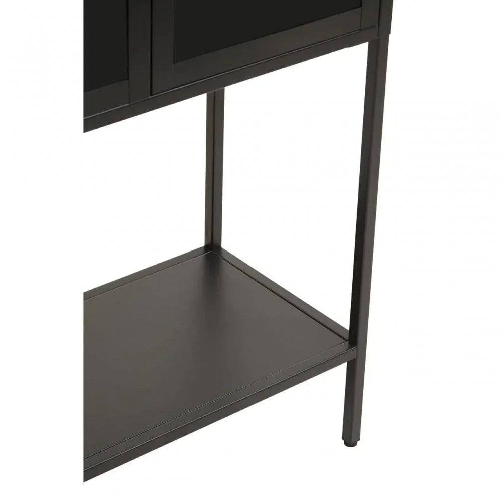 Black metal storage unit lower shelf and legs closeup