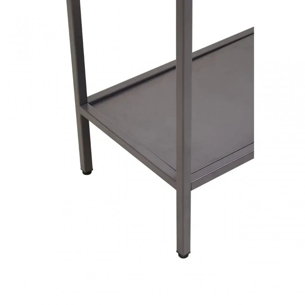 Close view of metal frame and lower shelf of grey storage unit