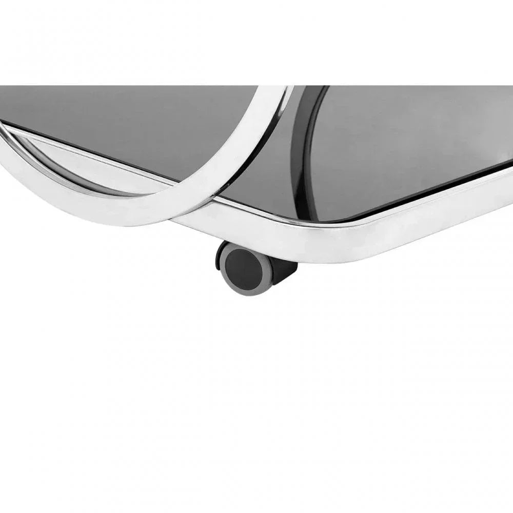 Chrome coffee table base with black glass shelf and wheel caster detail