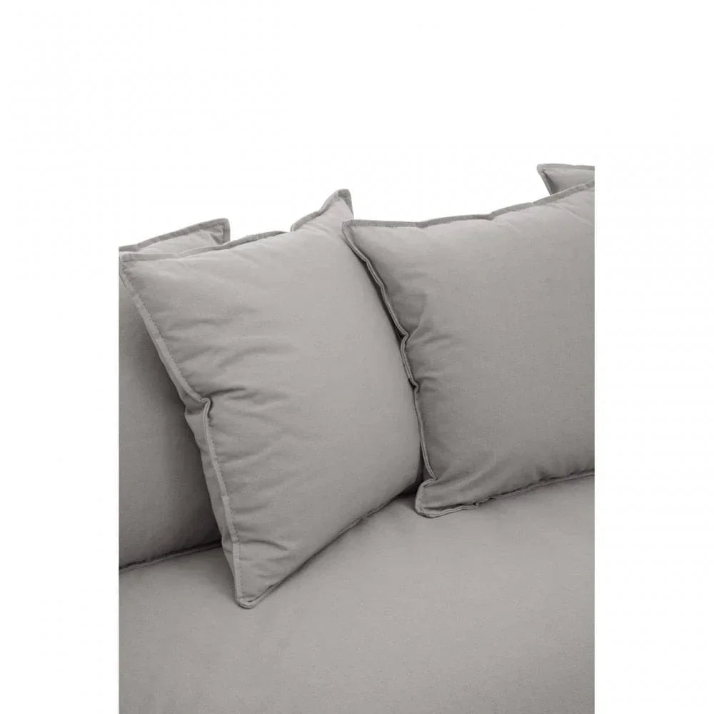 Close-up of grey fabric sofa cushions with soft padding