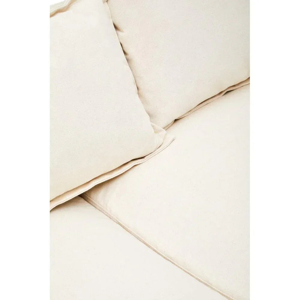 Close-up of cream fabric sofa cushions and seat detail