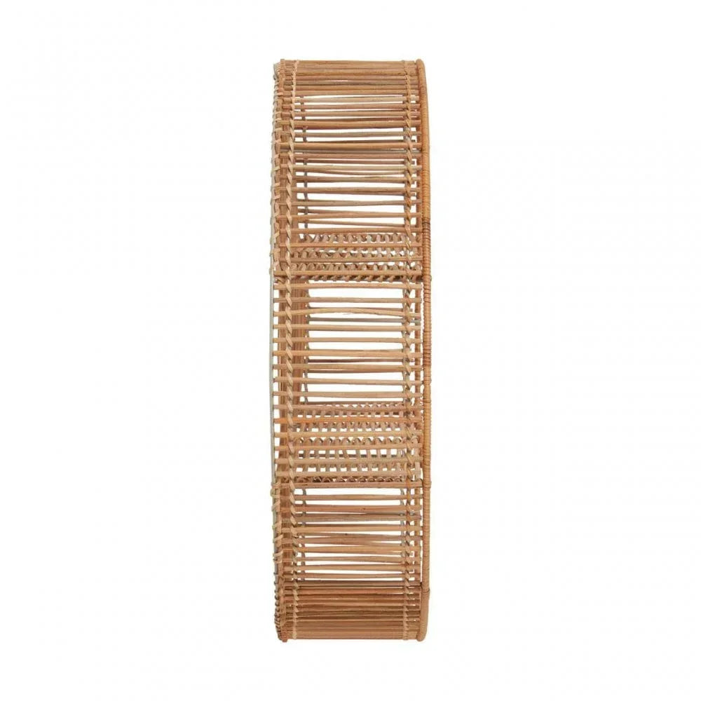 Side view of woven rattan wall shelf with open rectangular compartments