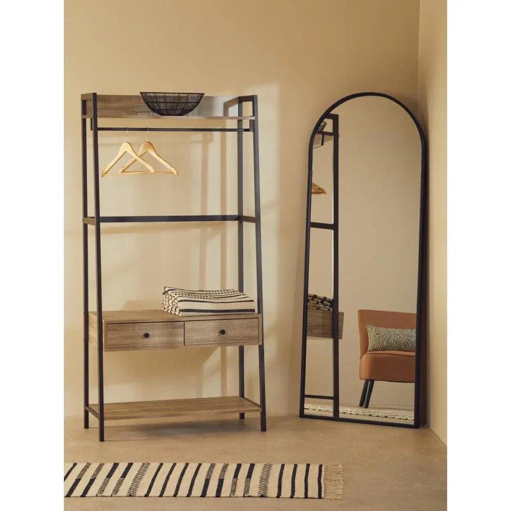 Wood and metal hallway storage unit with drawers, hangers, blanket and round wall mirror