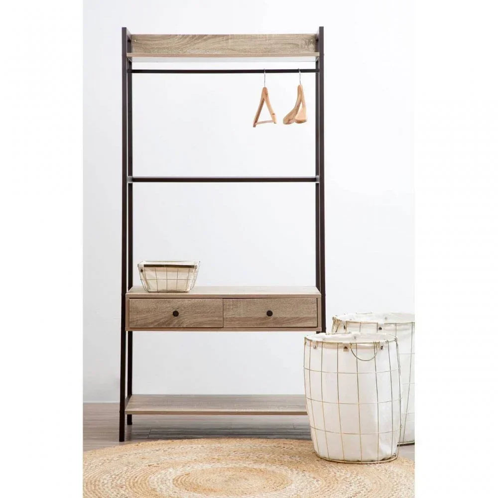 Wood and metal clothes rail with two drawers, two baskets, and coat hangers in a modern room