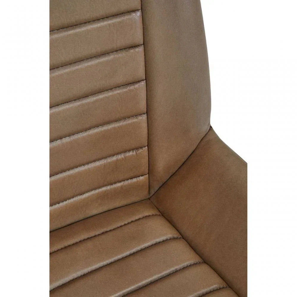 Close view of tan upholstered dining chair with horizontal stitched seat and backrest