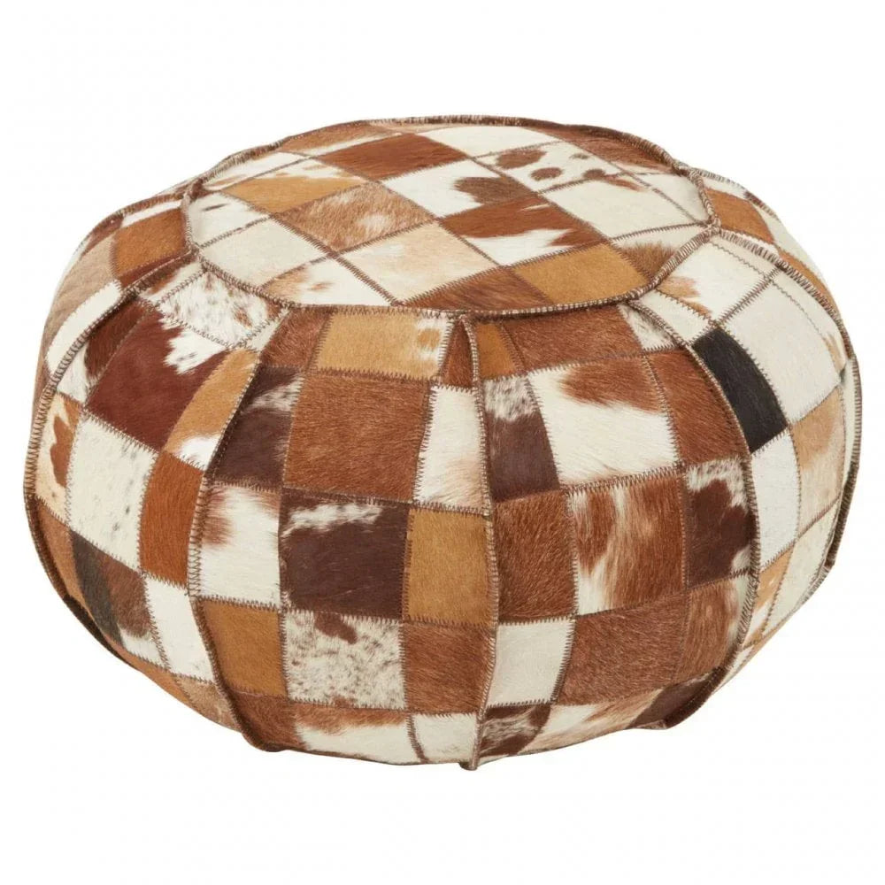 Brown and white patchwork cowhide pouffe ottoman with rounded shape